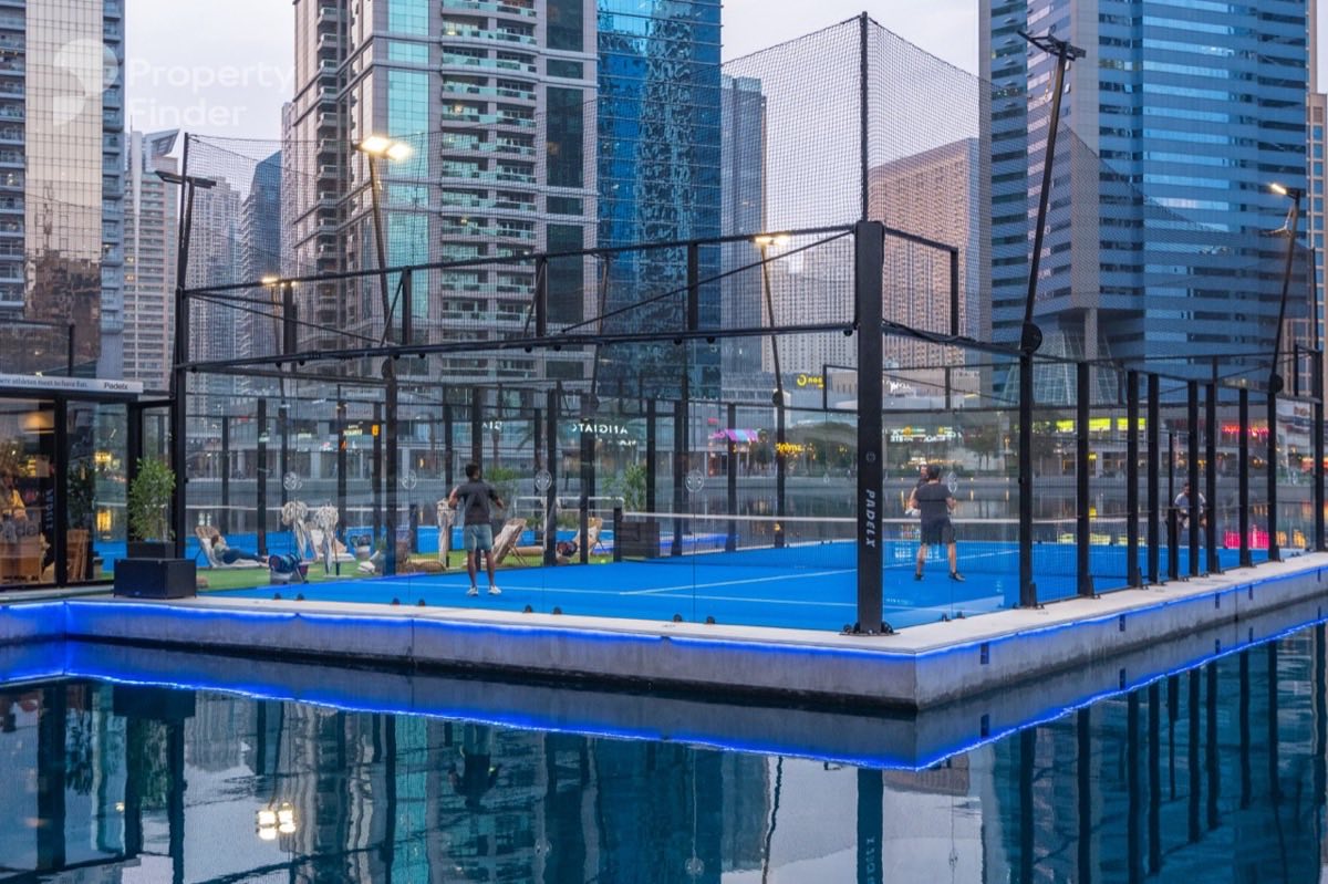 Floating padel court on the lake in Jumeirah Lake Towers