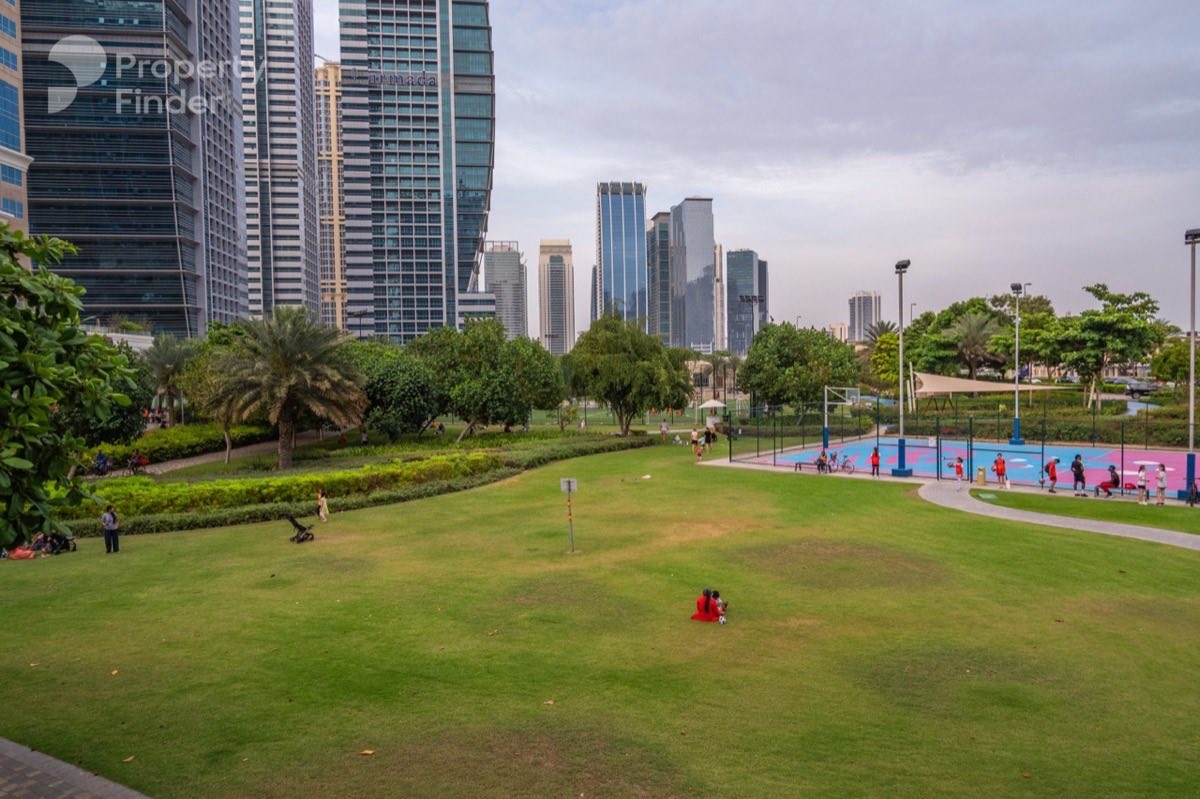 JLT Park lawn and courts near Green Lakes S2, Jumeirah Lake Towers